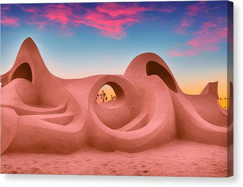 This is an African desert scene with sand on top of a hill