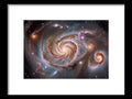 a close up of a spiral galaxy with stars and a black background
