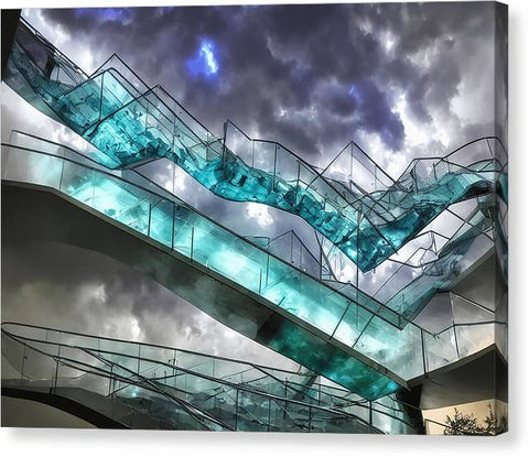 A staircase with glass stairs that pass under a sky