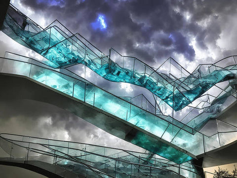 a stairway with a glass glass sculpture