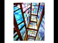 a framed shot of some stained glass with glass framed in a room